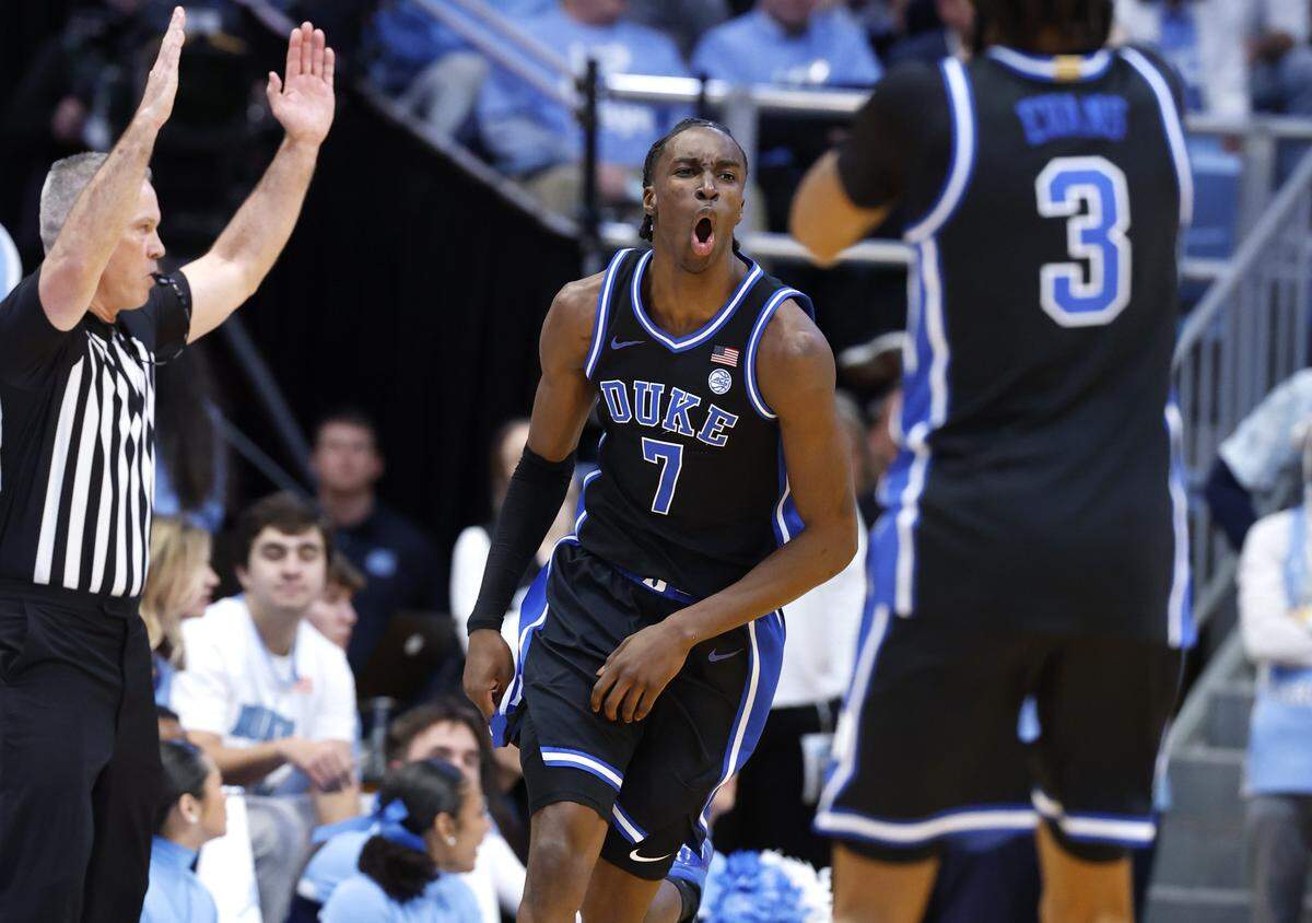 Duke’s Dame Sarr (7) celebrates hitting a three-pointer during the first half of Duke’s game against UNC at the Dean E. Smith Center in Chapel Hill, N.C., Saturday, Feb. 7, 2026.