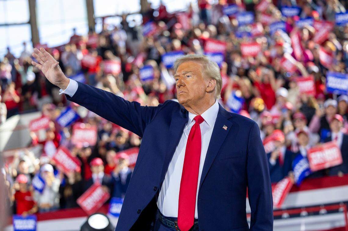 Republican presidential nominee and former President Donald Trump leaves the stage following a rally at Dorton Arena in Raleigh on Monday, Nov. 4, 2024, one day before Election Day.