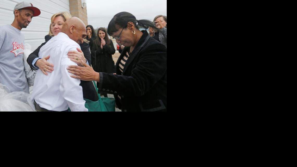 Joseph Sledge hugs Christine Mumma, director of the North Carolina Center on Actual Innocence, on Friday after his release from jail in Whiteville. To the right is his sister Barbara Kinlaw and to the left is his nephew Maurice Sledge. Three judges agreed to exonerate Sledge in a 1976 double murder after a special session of superior court. Sledge, 70, has been proclaiming his innocence for more than three decades.
