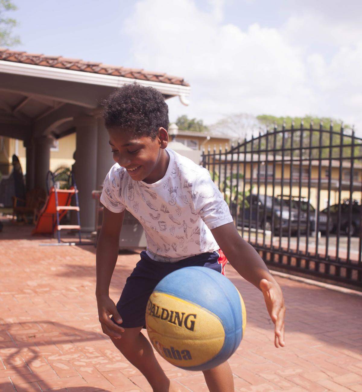 Matt and Misty’s oldest son shoots hoops in their driveway