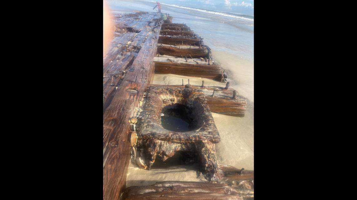 This mystery shipwreck surfaced on NC Outer Banks over the summer, igniting debate over its identity. Archaeologists have a theory.