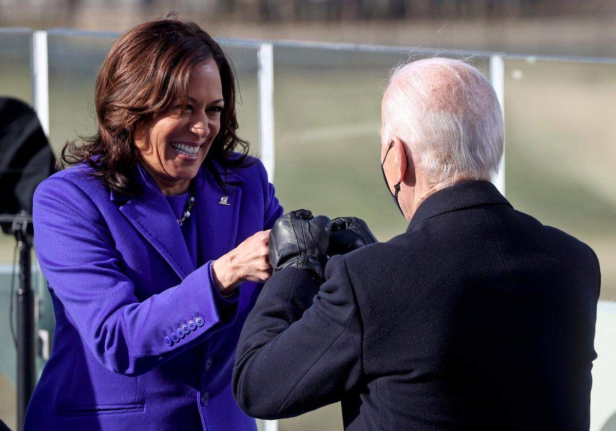 Vice President Kamala Harris bumps fists with President-elect Joe Biden after she was sworn in during the inauguration, Wednesday, Jan. 20, 2021, at the U.S. Capitol in Washington.