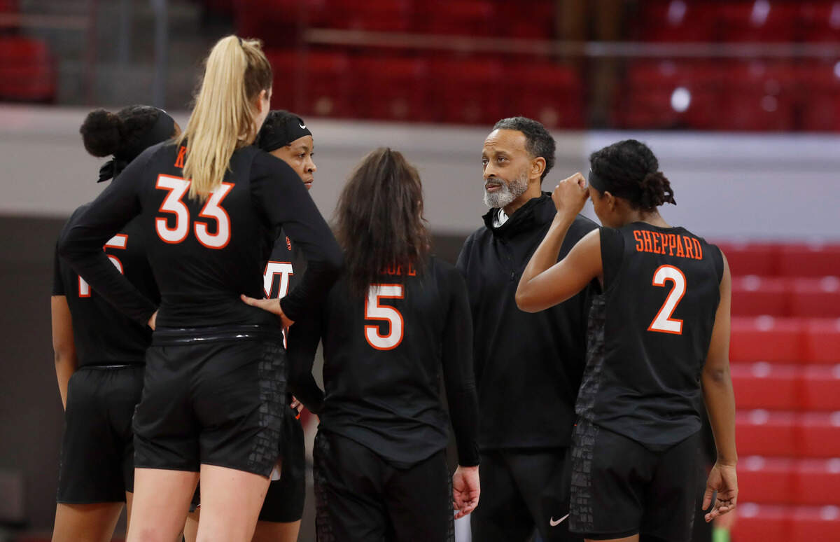 Virginia Tech head coach Kenny Brooks talks with his team during the second half of N.C. State’s 89-87 victory over Virginia Tech at Reynolds Coliseum in Raleigh, N.C., Sunday, January 24, 2021.