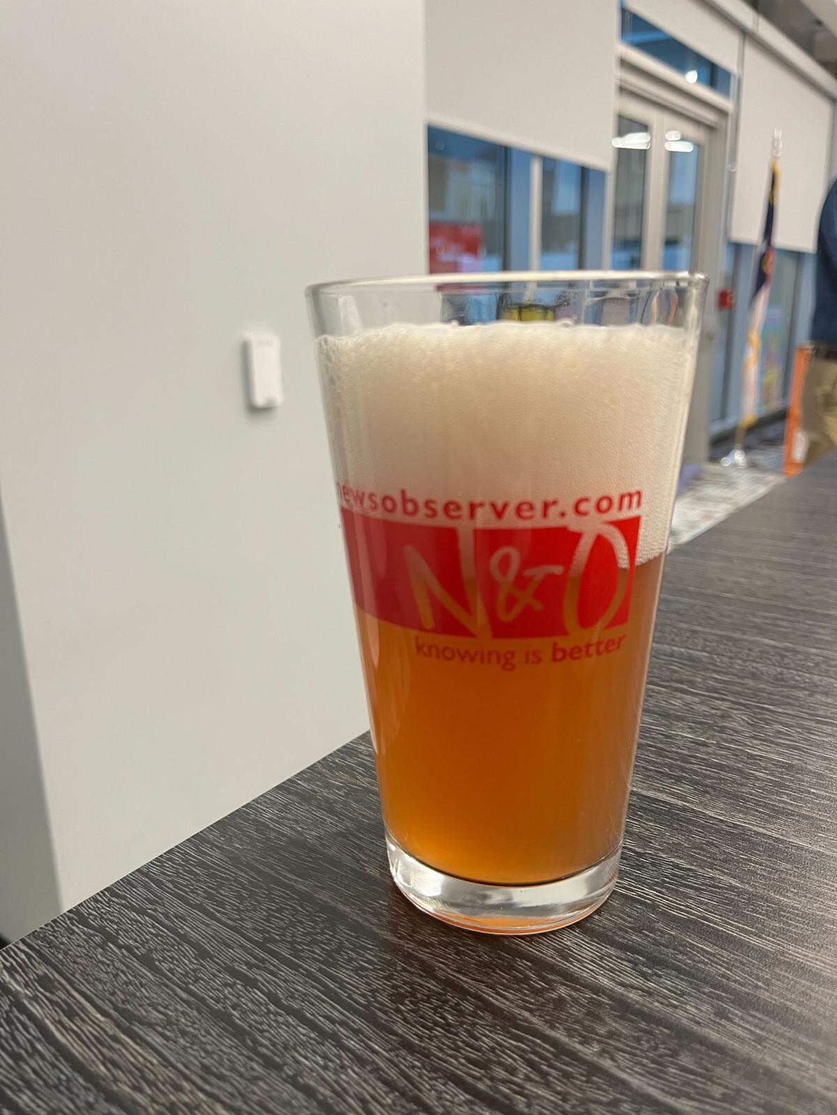 NoDa Brewing’s Cheerwine Ale beer in an N&O pint glass. Yes, the photographer is aware that there’s a lot of foam on top.