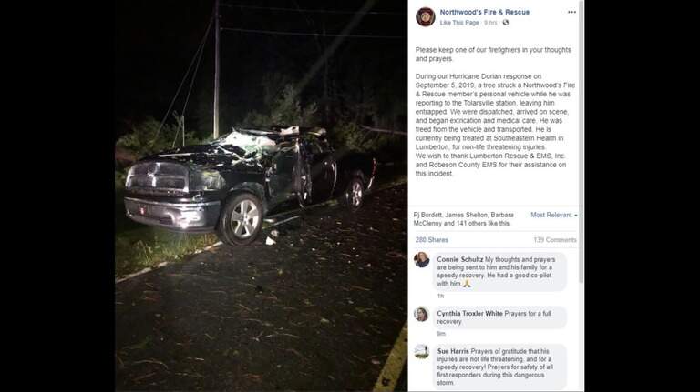 Firefighters save one of their own when Dorian pushes tree on truck, NC officials say