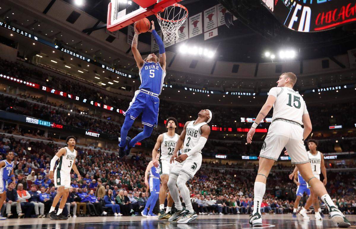 Duke’s Tyrese Proctor (5) heads in to score two during Duke’s 74-65 victory over Michigan State in the Champions Classic at the United Center in Chicago, IL, Tuesday, Nov. 14, 2023.