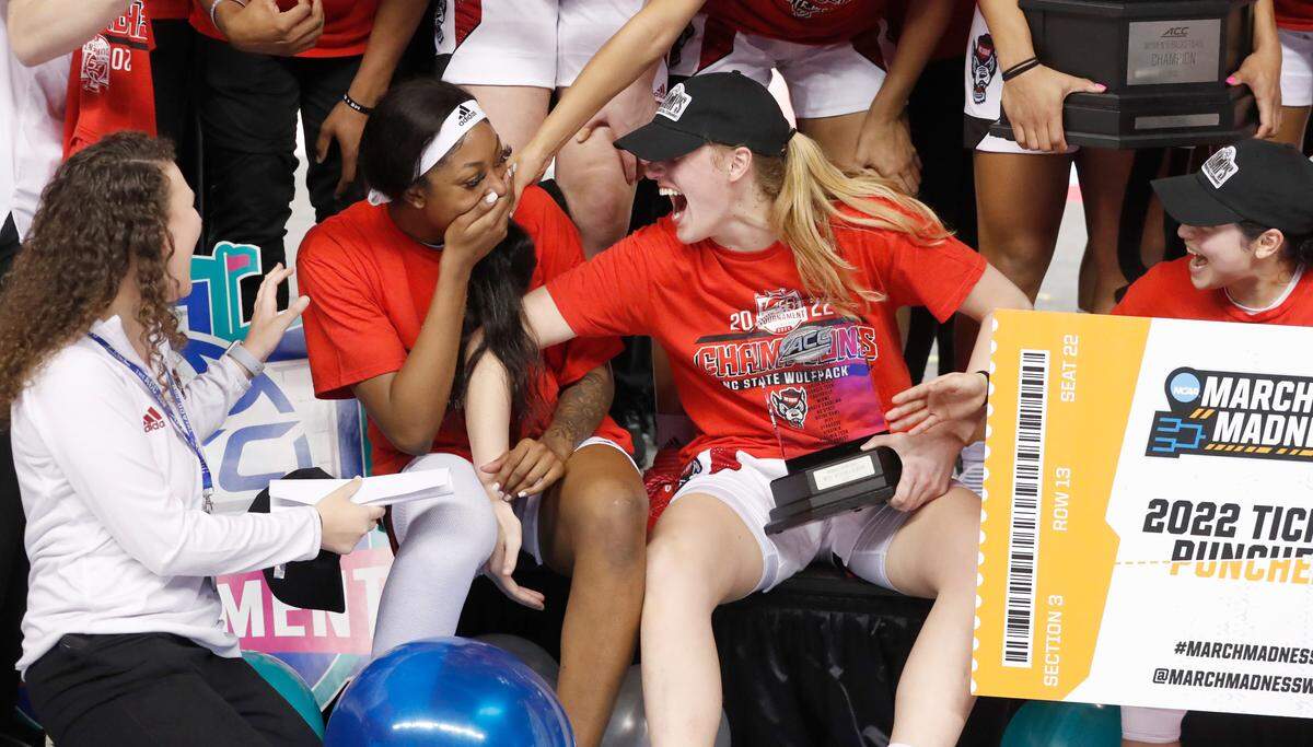 N.C. State’s Elissa Cunane, right, celebrates with Jada Boyd after Boyd was named to the all-tournament team after the Wolfpack’s victory over Miami to win the ACC women’s basketball tournament in Greensboro, N.C., Sunday, March 6, 2022.