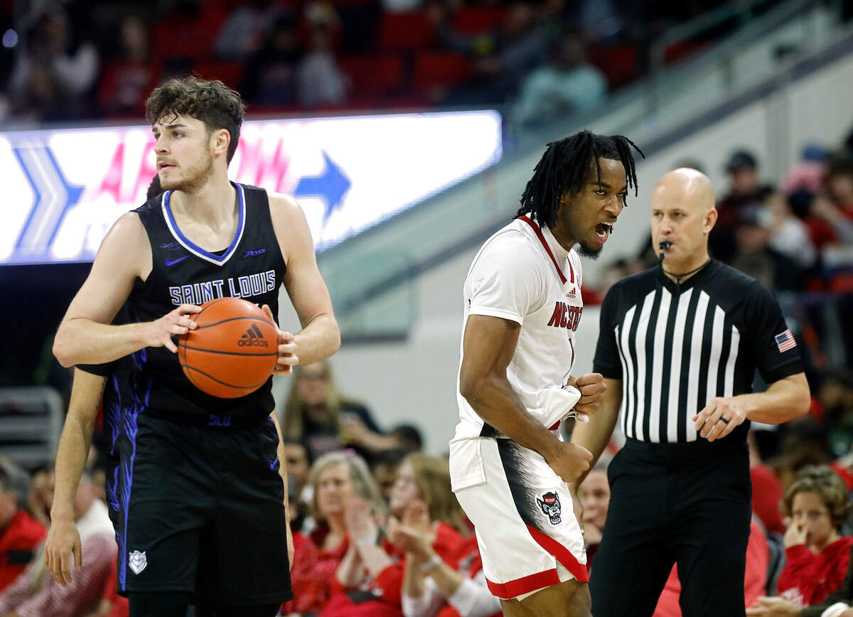 N.C. State’s Jayden Taylor reacts after forcing a Saint Louis turnover during the first half of the Wolfpack’s 82-70 win on Wednesday, Dec. 20, 2023, at PNC Arena in Raleigh, N.C.