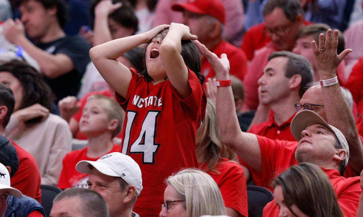 A Wolfpack fan can’t believe the call during the second half of N.C. State’s 67-58 victory over Marquette in their NCAA Tournament Sweet 16 game at the American Airlines Center in Dallas, Texas, Friday, March 29, 2024.