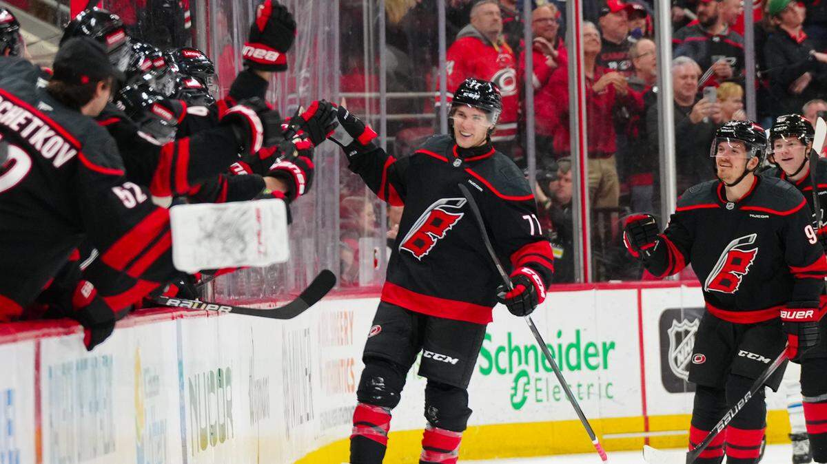New Carolina Hurricanes center Mark Jankowski (77) celebrates a goal against the Winnipeg Jets at the Lenovo Center. Jankowski has six goals in his first seven games with the team.