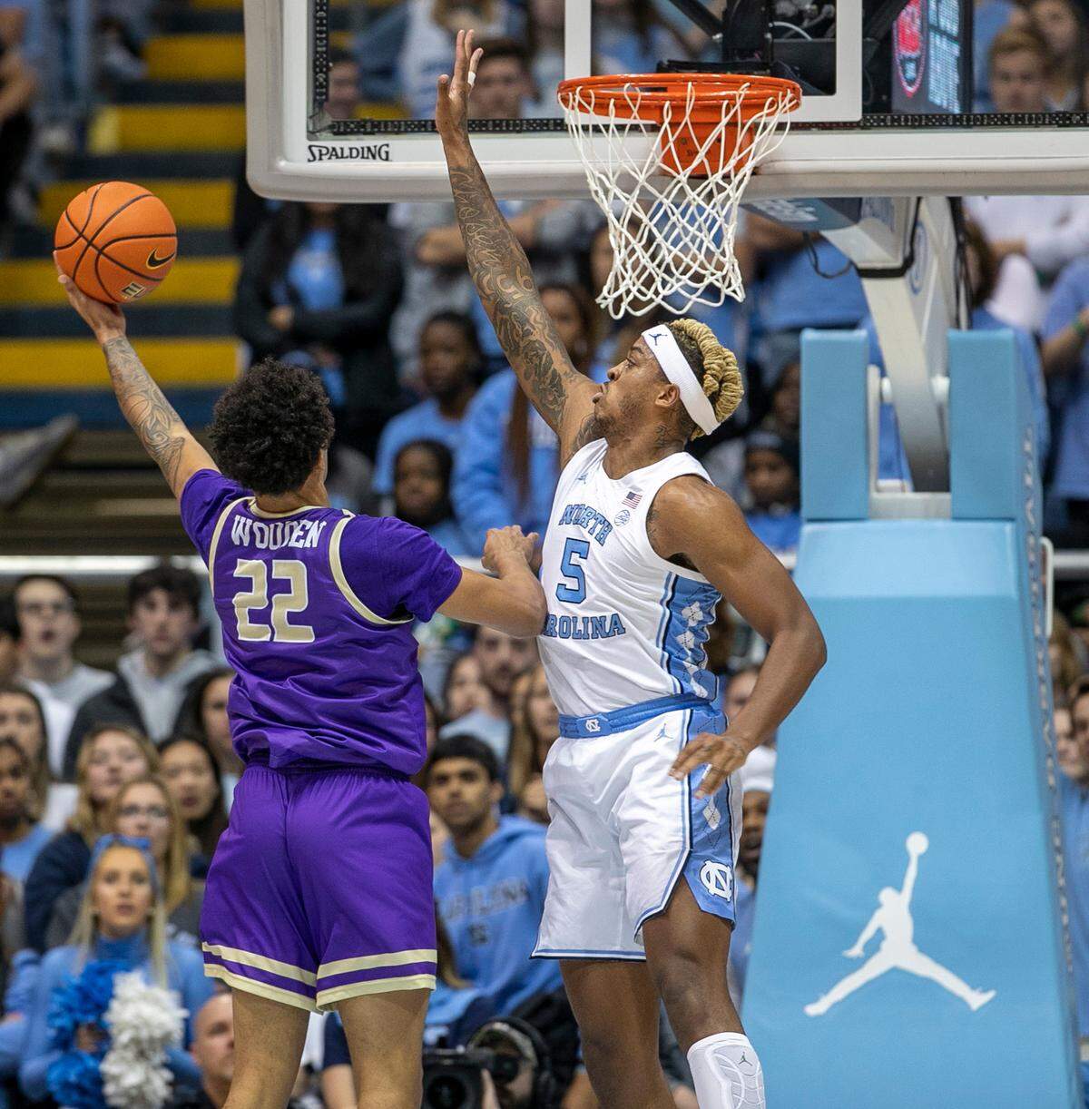North Carolina’s Armando Bacot (5) defends James Madison’s Julien Wooden (22) in the first half on Sunday, November 20, 2022 at the Smith Center in Chapel Hill, N.C.