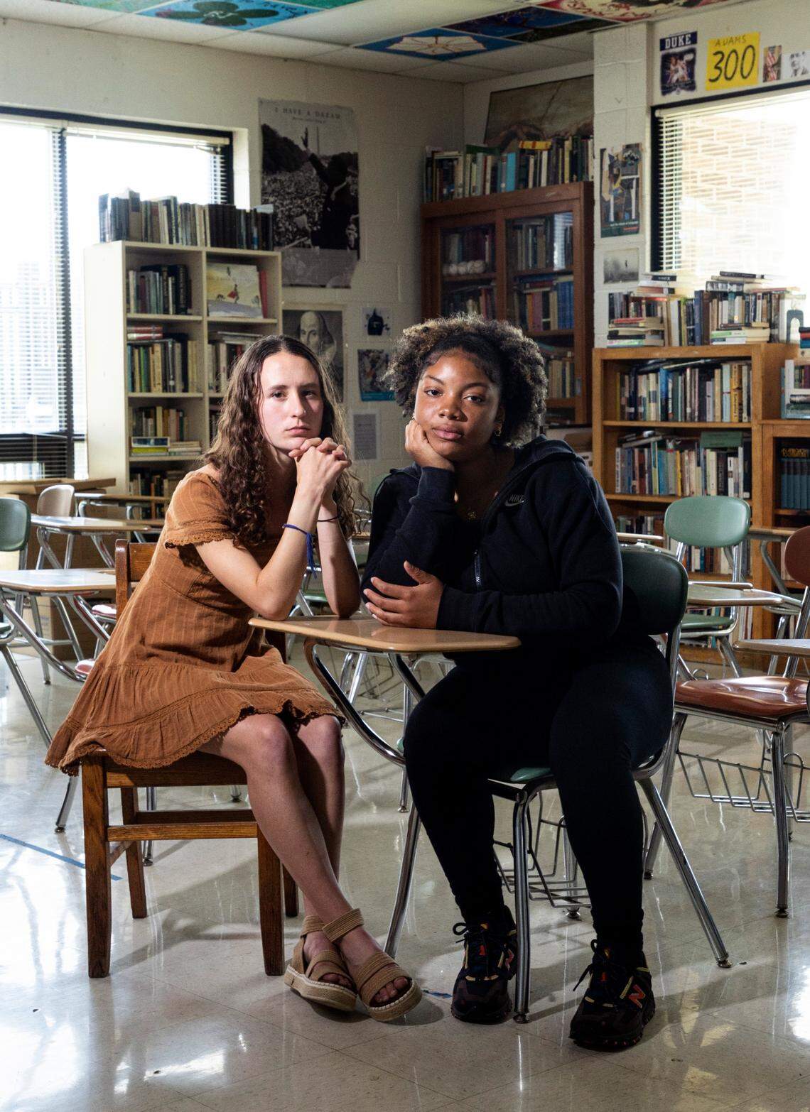 Northern High School seniors Abbey McKee, left, and Sydney Holland pose at the school in Durham, N.C., Friday, April 29, 2022.