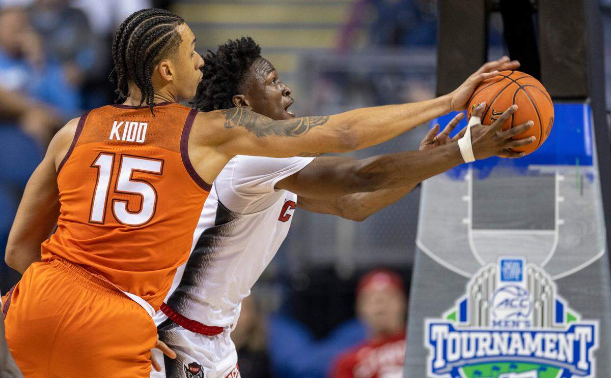 Virginia’s Tech’s Lynn Kidd (15) defends N.C. State’s Jarkel Joiner (1) in the second half against Virginia Tech in the second round of the ACC Tournament on Wednesday, March 8, 2023 at the Greensboro Coliseum in Greensboro, N.C.