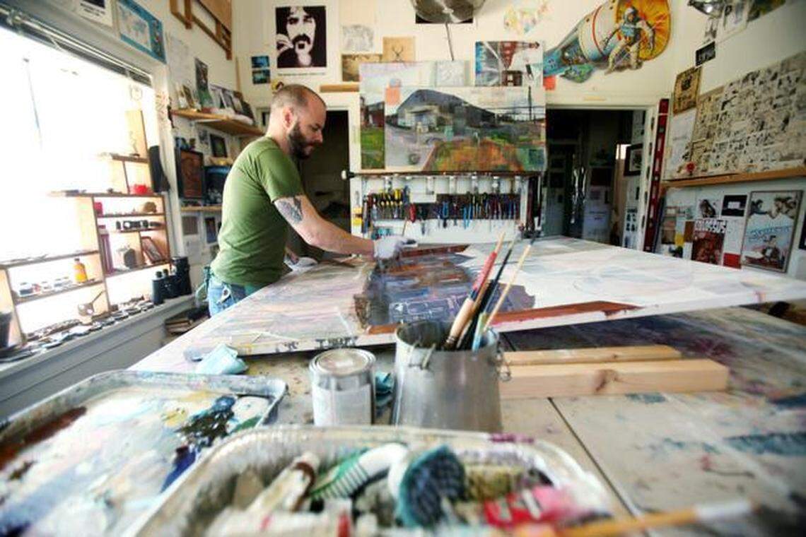 Luke Buchanan, photographed in 2014, is known for his murals on the walls of Raleigh buildings. They include the iconic “All are welcome, Raleigh, NC” on the side of Poole’side Pies, the fire escape maze on the side of Death & Taxes restaurant and the Royal Crown Cola sign on Hillsborough Street.