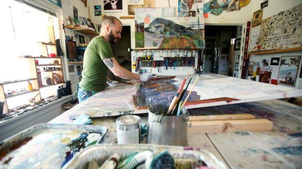 Luke Buchanan, photographed in 2014, is known for his murals on the walls of Raleigh buildings. They include the iconic “All are welcome, Raleigh, NC” on the side of Poole’side Pies, the fire escape maze on the side of Death & Taxes restaurant and the Royal Crown Cola sign on Hillsborough Street.