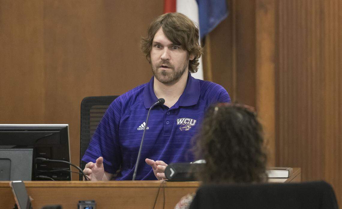 Joseph Kiser testifies in Orange County Superior Court how he discovered the bodies of 14-year-old Lyric Woods and 18-year-old Devin Clark, during opening testimony in the trial of Issiah Ross on Wednesday, Jan. 14, 2026, in Hillsborough, N.C.  Ross is accused of killing Woods and Clark in 2022 near Efland. 