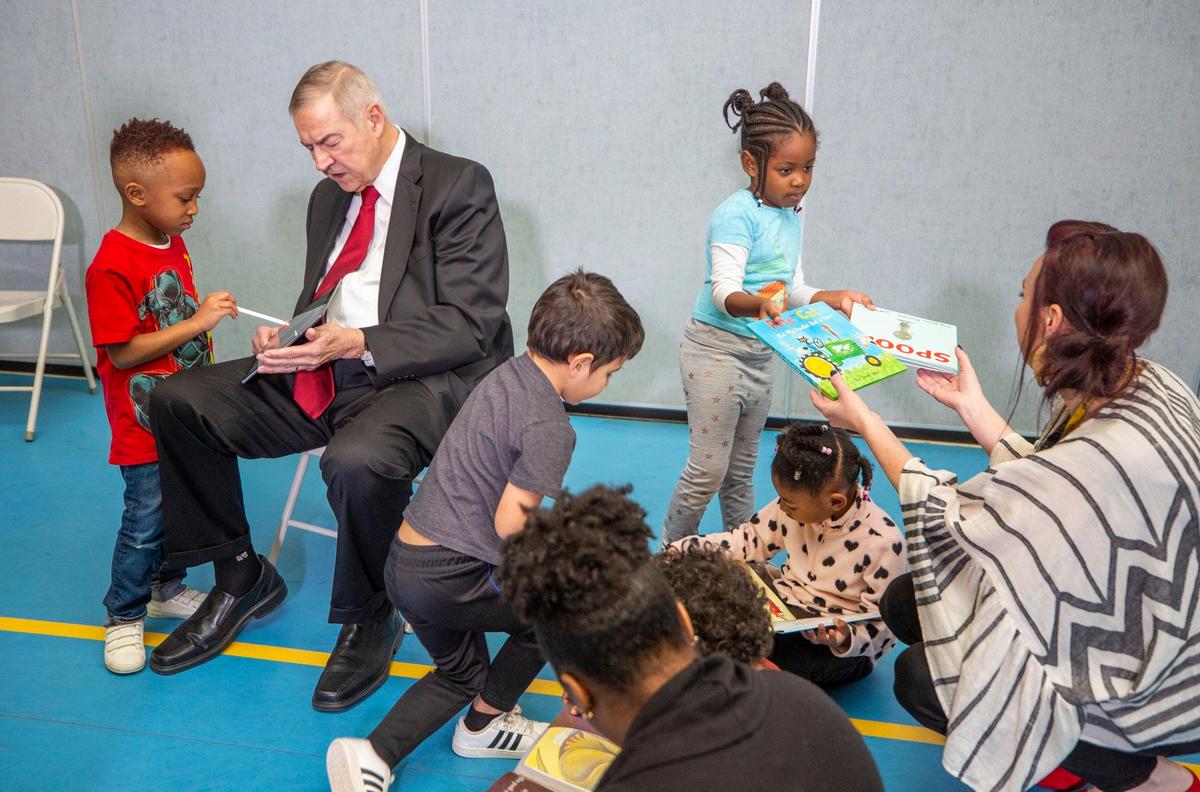 Jim Goodnight, CEO of SAS, reads to kindergarten children after a press conference with other prominent CEOs in the state to discuss the importance of increasing participation in NC Pre-K to 75 percent of eligible children, at Millbrook Elementary School on Thursday, Jan. 17, 2019, in Raleigh, NC.