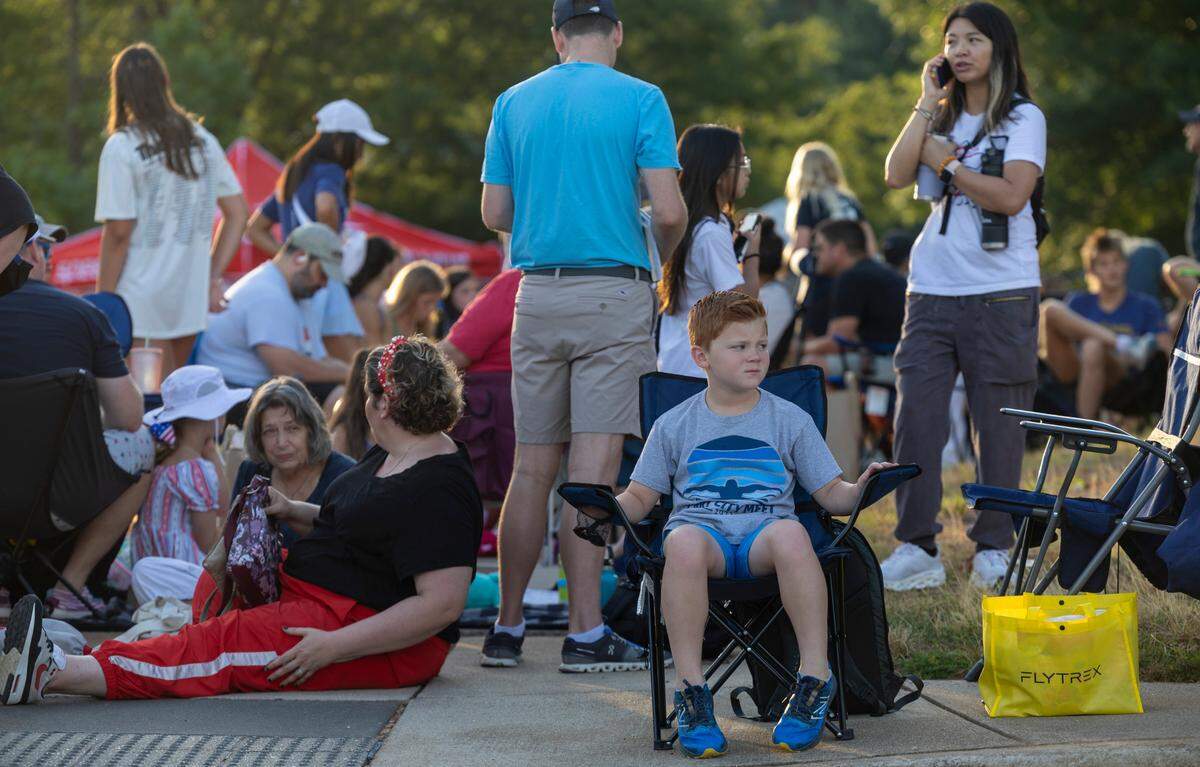 Davis King of Holly Springs, N.C. was in line by 6:15 a.m. to enter the Triangle Aquatic Center to watch the 2024 United States Olympic Swim Team on Saturday, July 6, 2024 in Cary, N.C