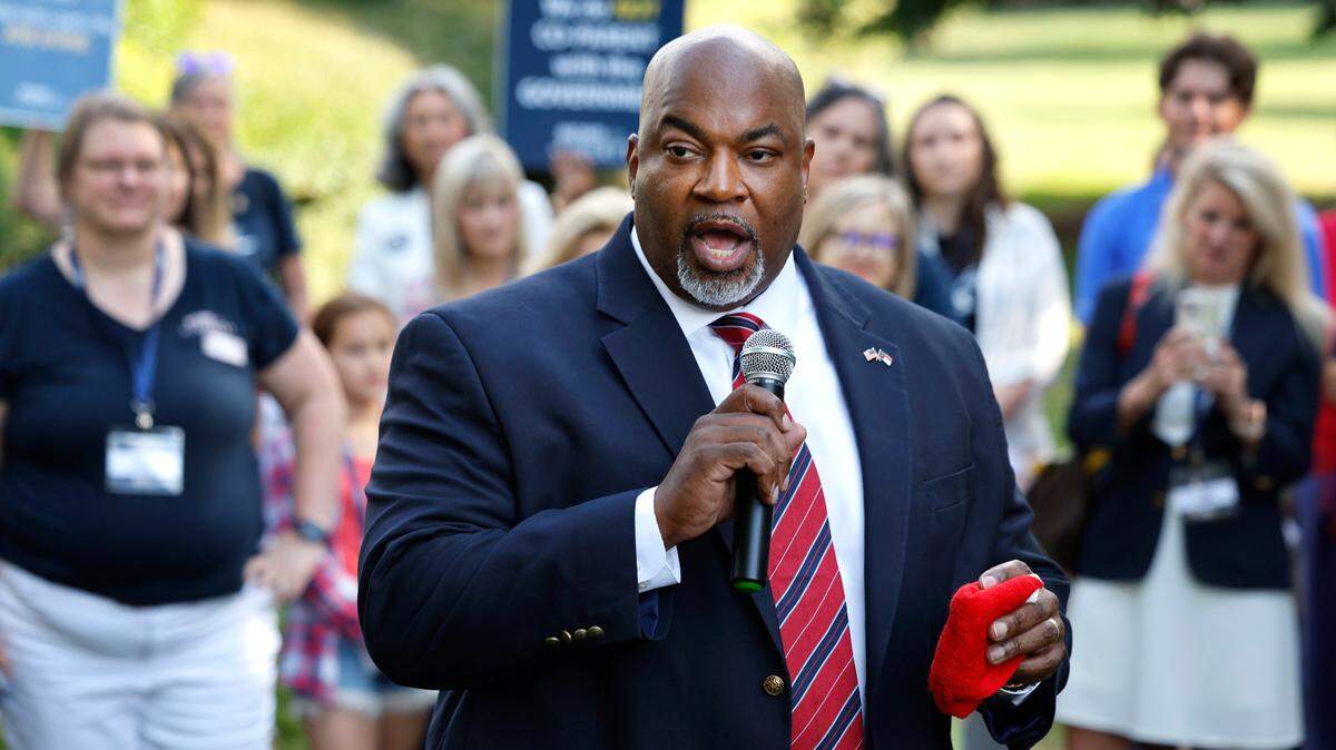 Republican Lt. Gov. Mark Robinson, who is running for governor, speaks at a Moms for Liberty rally outside the Legislative Building in Raleigh, N.C. on June 12, 2024.