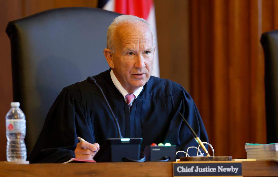 Chief Justice Paul Newby asks a question during oral arguments at the Supreme Court of North Carolina in Raleigh, N.C., Monday, May 9, 2022.