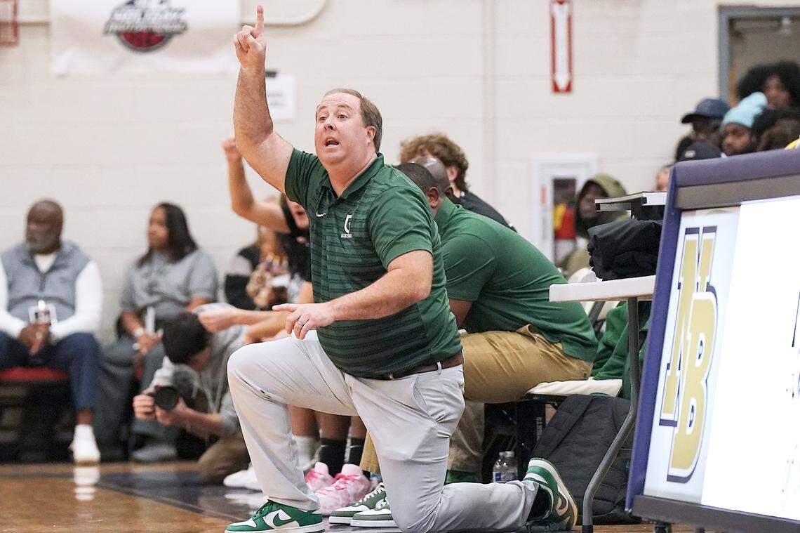 Greenfield head coach Rob Salter gives direction to his team against Coronado during the first half. The Greenfield Knights and the Coronado Cougars (Nevada) met in the finals of the Day'Ron Sharpe bracket of the  John Wall Holiday Tournament in Raleigh, N.C. on December 30, 2025.