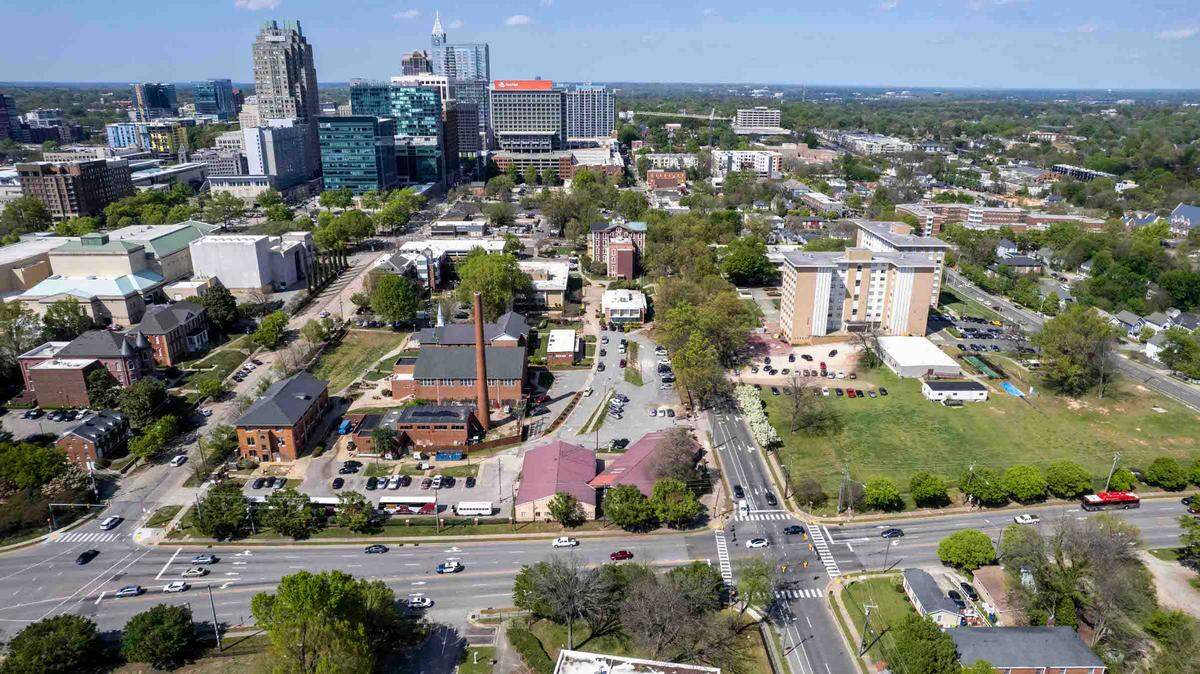 An aerial view of Shaw University campus, lower foreground, in relation to downtown Raleigh Tuesday, April 4, 2023. University leaders want to rezone about 26 acres of the downtown Raleigh property to allow taller, denser buildings.