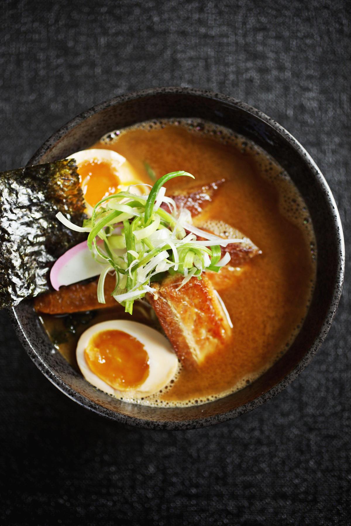 Zanyu’s pork belly miso ramen soup is on a par with the best ramen bowls youÕll find in these parts. Featuring toothsome ribbons of confit pork belly, a perfect ajitsuke egg, tofu pouches stuffed with sushi rice, fish cake, and gratifyingly chewy noodles in a silky pork broth enriched with miso and garnished with a sheet of nori.