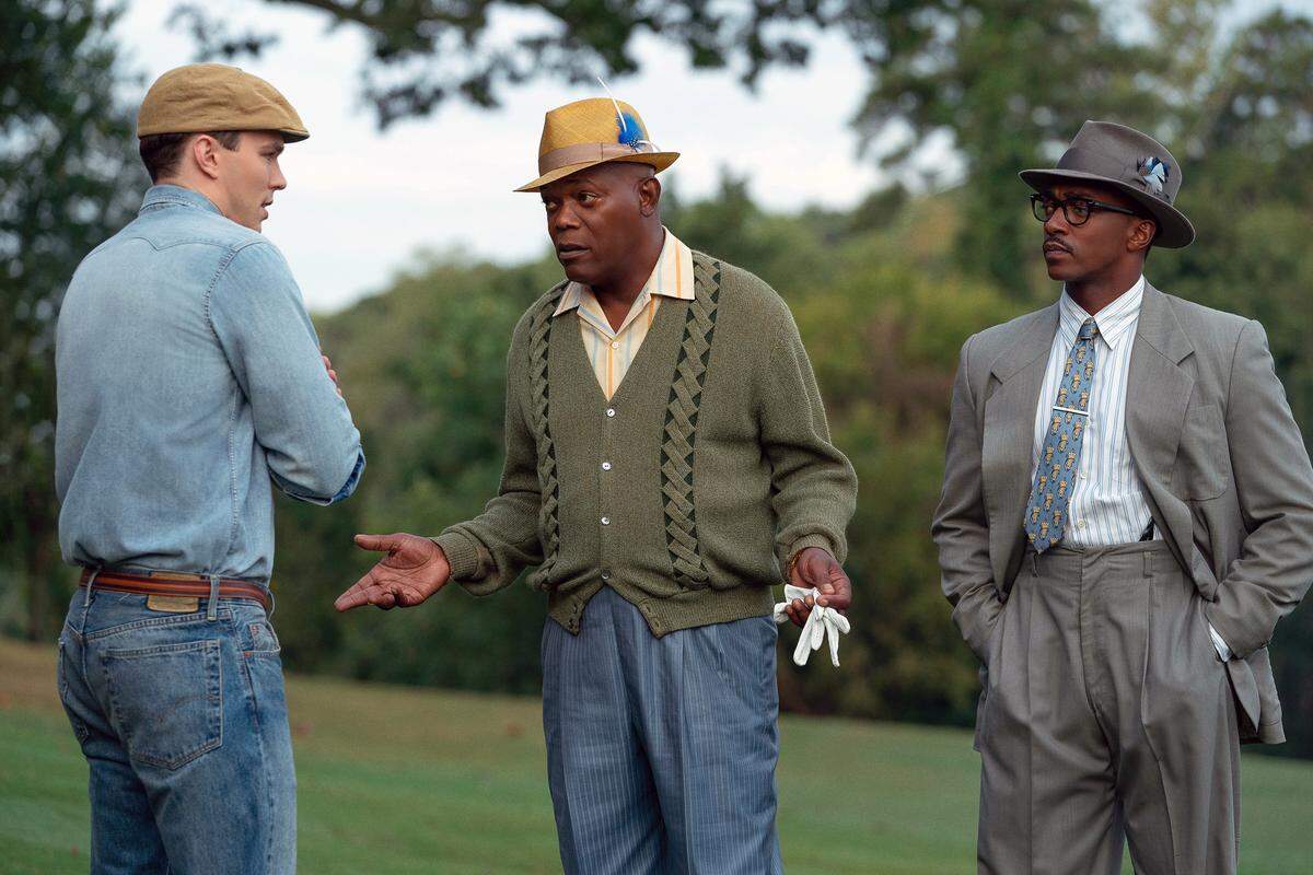 From left, Nicholas Hoult, Samuel L. Jackson and Anthony Mackie in a scene from “The Banker.”