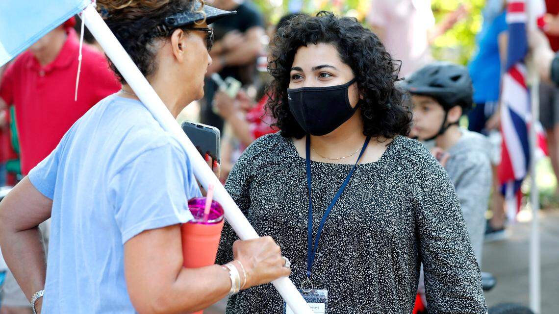 Laura Brache interviews Gabriela Jauregui Matthews, who is originally from Argentina, at the Watts-Hillandale neighborhood’s 72nd annual Fourth of July celebration in Durham, N.C, Sunday, July 4, 2021.