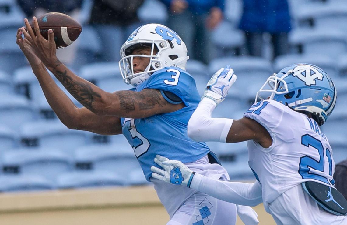 North Carolina’s Antonie Green (3) pulls in a long pass from quarterback Sam Howell during the Tar Heels’ Spring football game on Saturday, April 24, 2021 in Chapel Hill, N.C.