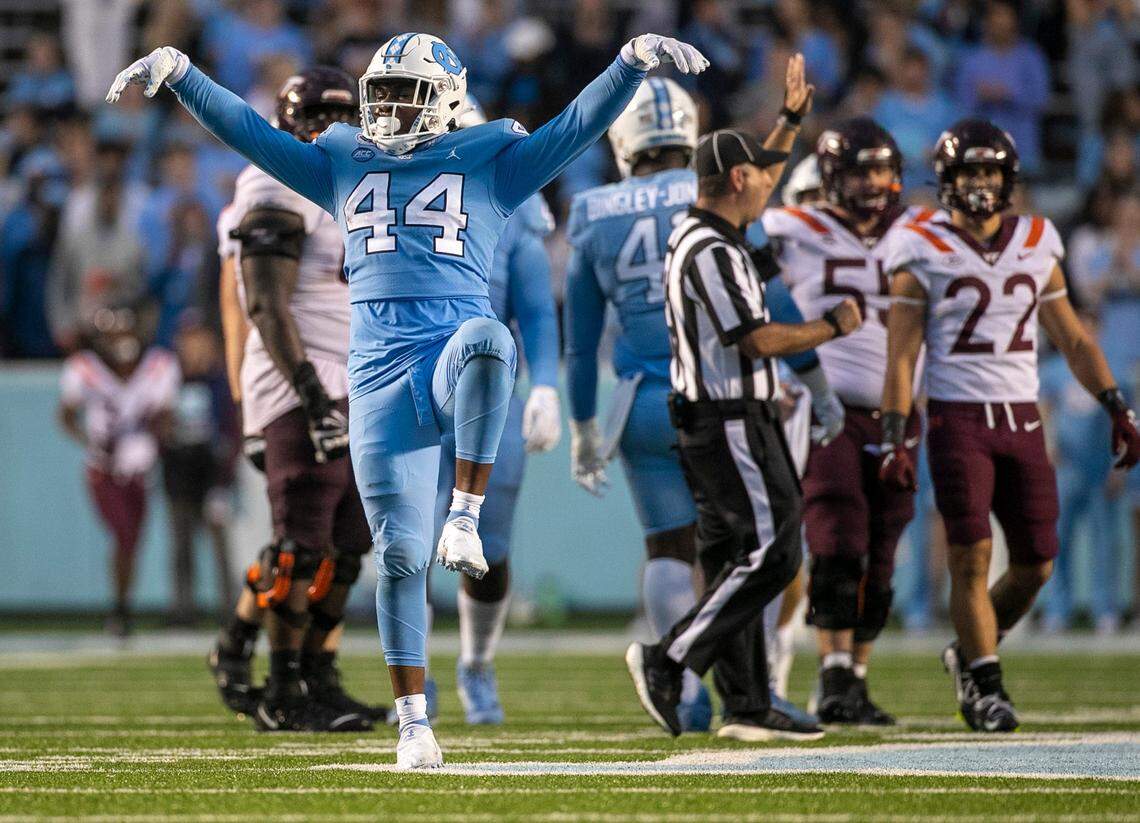 North Carolina’s Randy Caldwell (44) reacts after a sack of Virginia Tech quarterback Jason Brown (1) in the fourth quarter on Saturday, October 1, 2022 at Kenan Stadium in Chapel Hill, N.C.