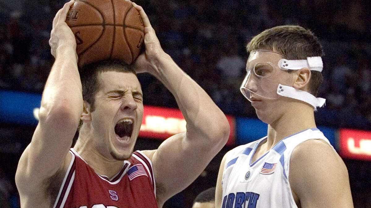 FILE PHOTO - Tampa, Fla.--UNC’s Tyler Hansbrough (50) looks on as N.C. State’s Ben McCauley (34) reacts after fouling UNC’s Wayne Ellington (2) with 1:14 left to play in the second half on Sunday March 11, 2007 in the St. Pete Times Forum. Ellington made both free throws to give UNC a 80-75 lead.