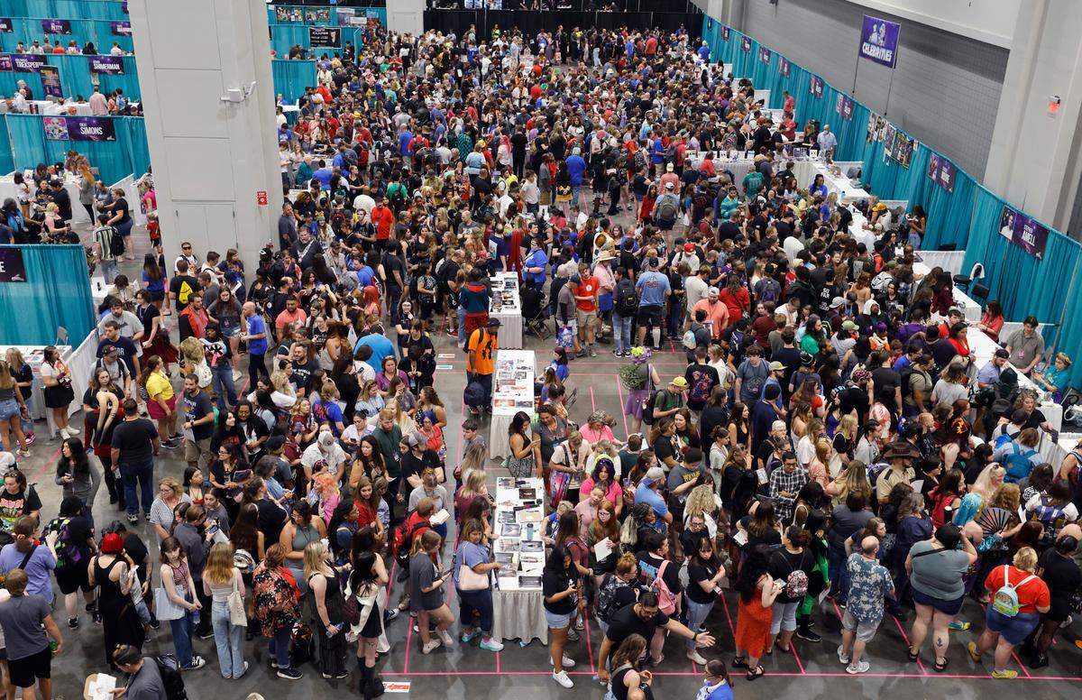 Crowds line up for autographs and selfies with stars during GalaxyCon Raleigh at the Raleigh Convention Center Sunday, July 30, 2023.