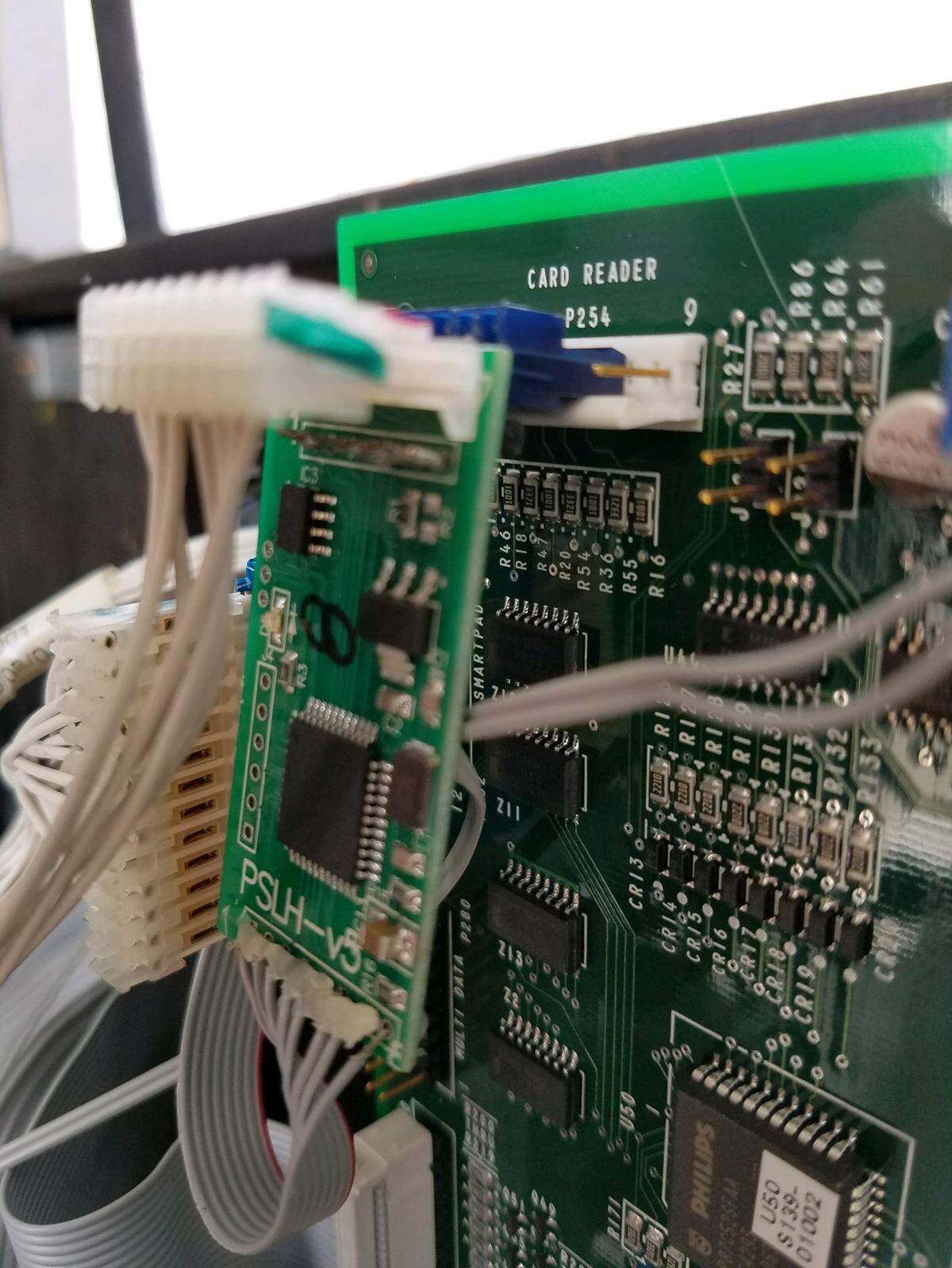 A skimmer device installed in a gas pump. Skimmers are devices that criminals install inside a gas pump to illegally collect customers’ debit card information.
