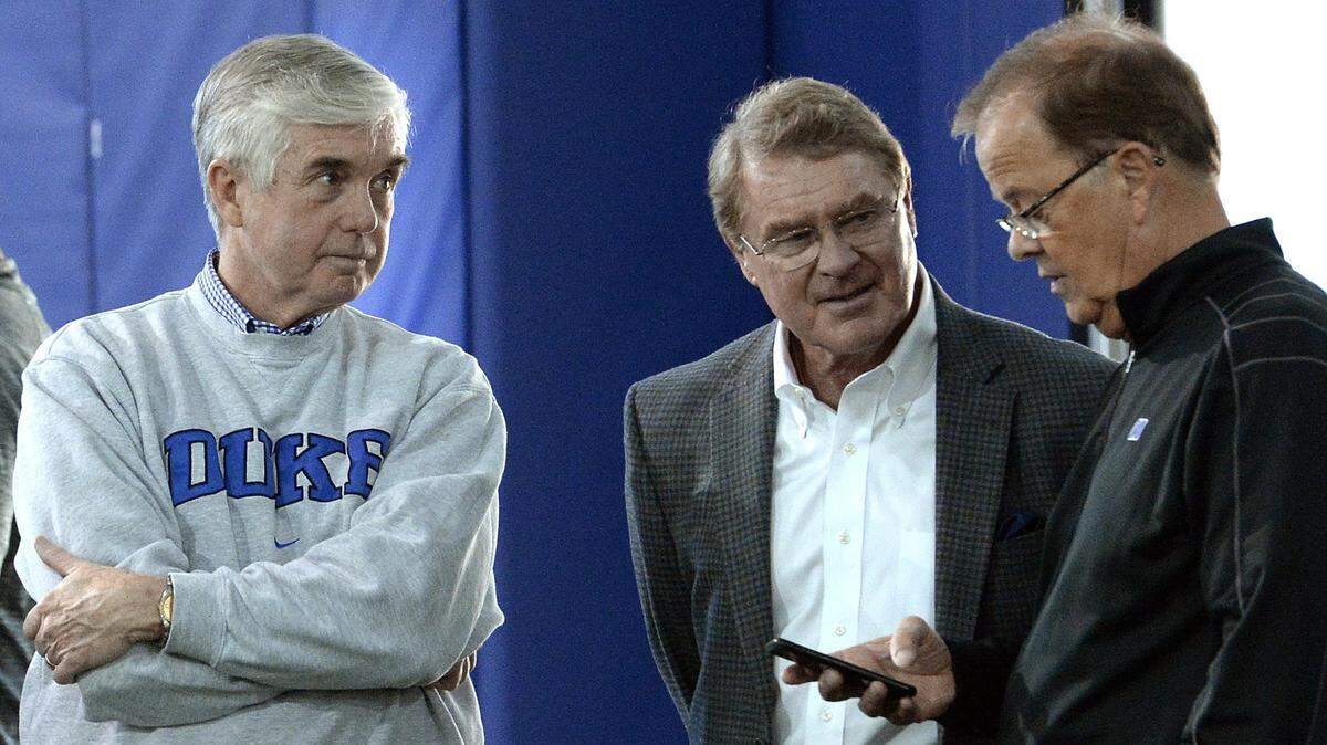 Duke athletic director Kevin White, left, and football coach David Cutcliffe speak with ACC Commissioner John Swofford during Duke football Pro Day in Durham, N.C., in 2017.