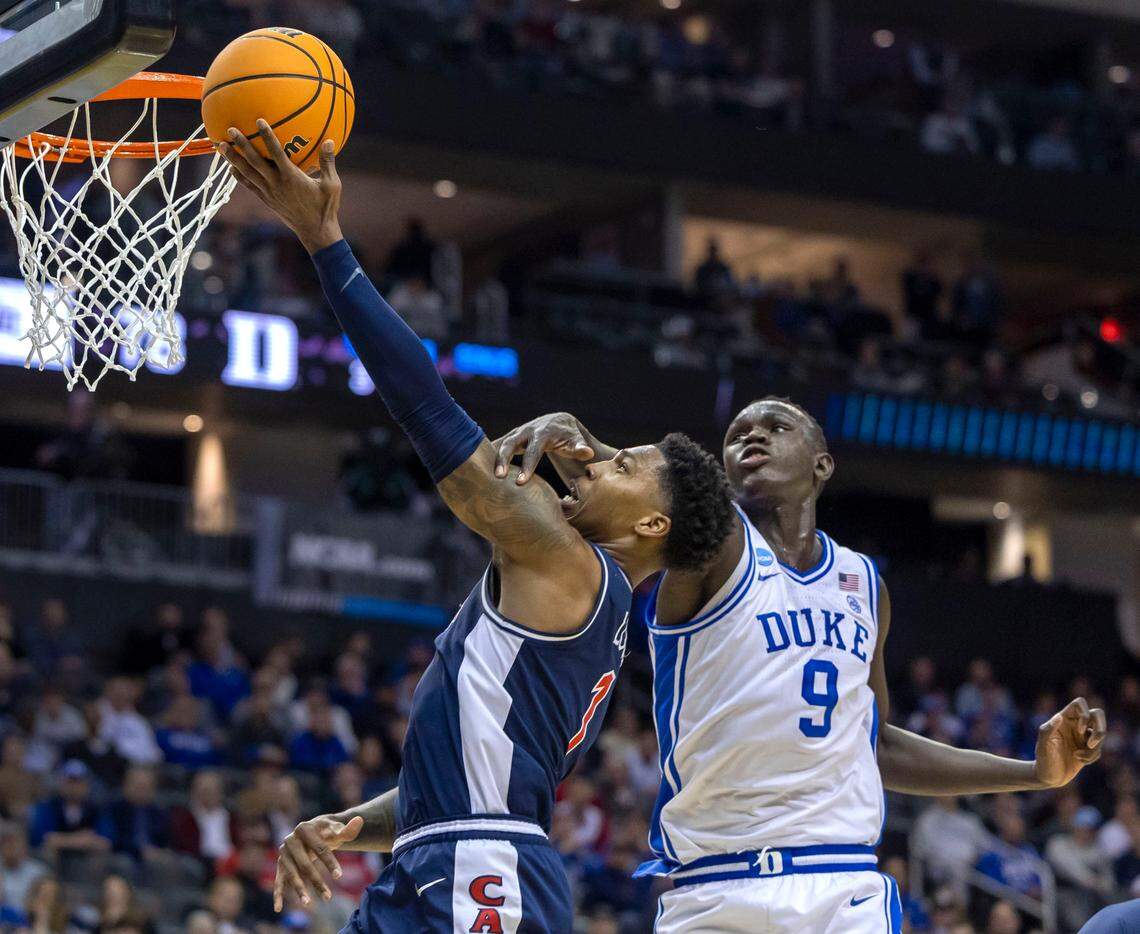 Duke center Khaman Maluach defends Arizona guard Caleb Love (1) in the second half on Thursday, March 27, 2025 during the NCAA Sweet 16 at Prudential Center in Newark, NJ. Love scored 35 points in the Wildcat’s 100-93 loss to Duke.