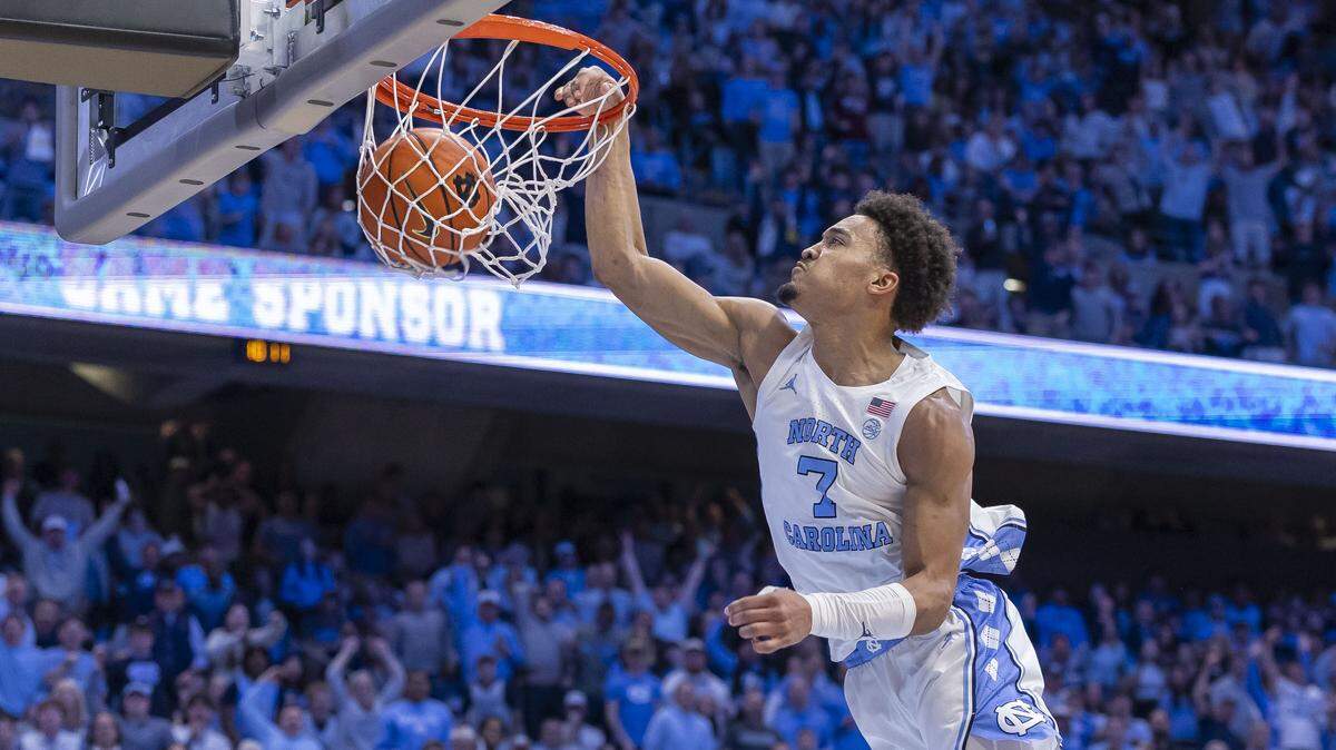 North Carolina guard Seth Trimble (7) soars to the rim for a dunk on a fast break in the second half against Virginia Tech on Saturday, February 28, 2026 at the Smith Center in Chapel Hill, N.C.  Trimble scored 20 points in the Tar Heels’ 89-82 victory. 
