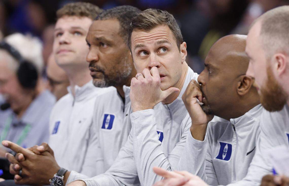Duke head coach Jon Scheyer watches during the first half of Duke’s game against Florida State in the quarterfinals of the 2026 ACC Men’s Basketball Tournament at the Spectrum Center in Charlotte, N.C., Thursday, March 12, 2026.