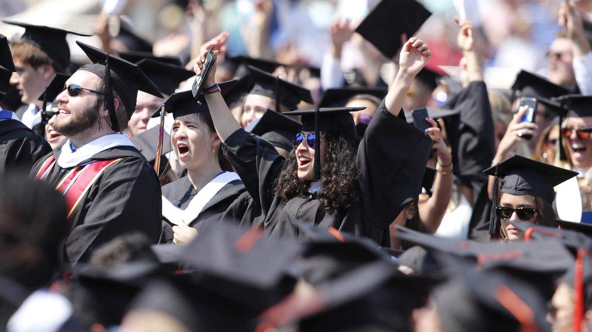 Graduates celebrate during Duke University’s commencement at Wallace Wade Stadium in Durham Sunday, May 13, 2018. The number of international science students applying to U.S. universities is in decline.