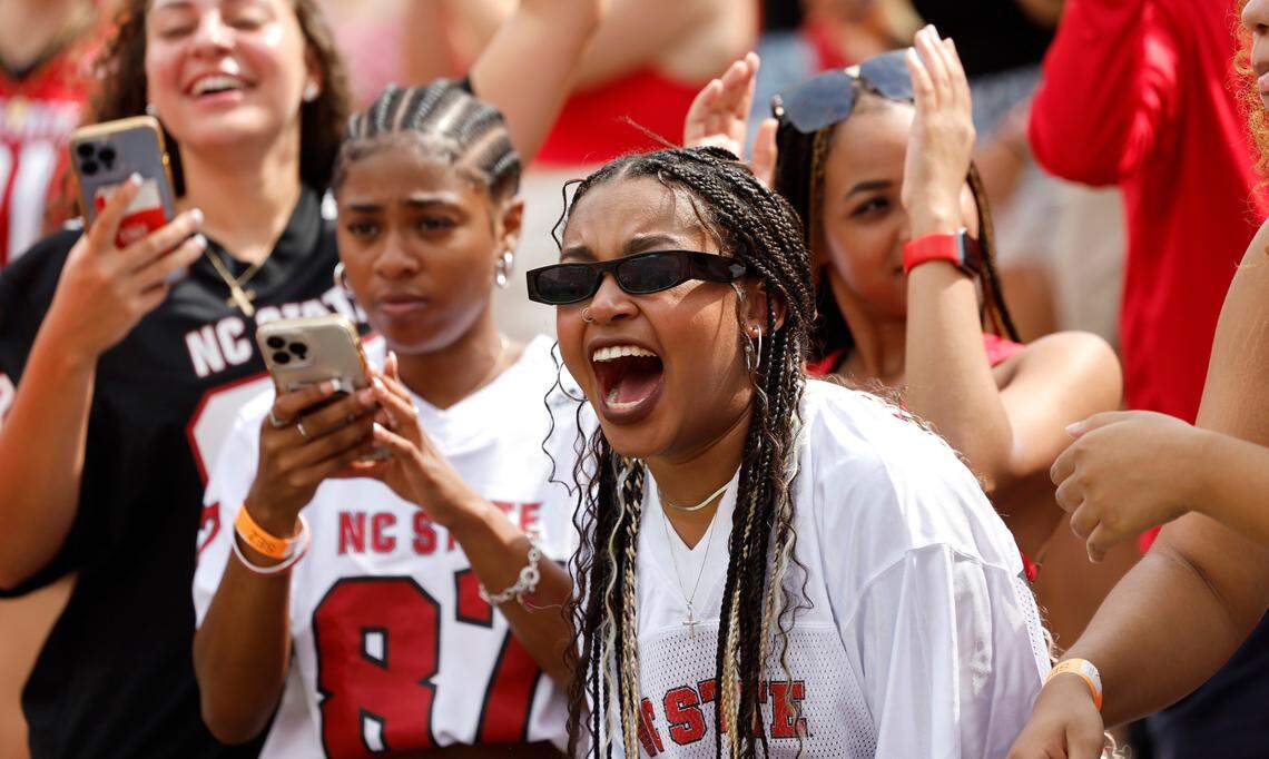 Fans cheer on the Wolfpack at the start of N.C. State’s game against Notre Dame at Carter-Finley Stadium in Raleigh, N.C., Saturday, Sept. 9, 2023.