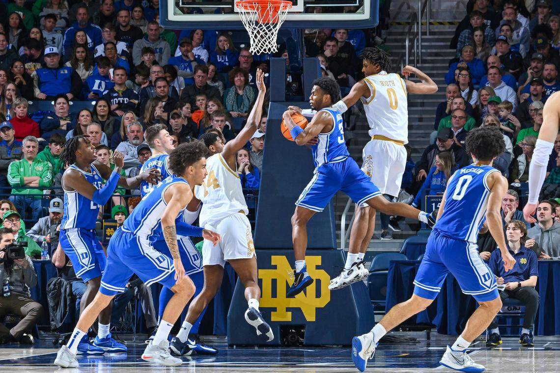 Duke Blue Devils guard Jeremy Roach (3) grabs a rebound in front of Notre Dame Fighting Irish forward Carey Booth (0) in the second half at the Purcell Pavilion.
