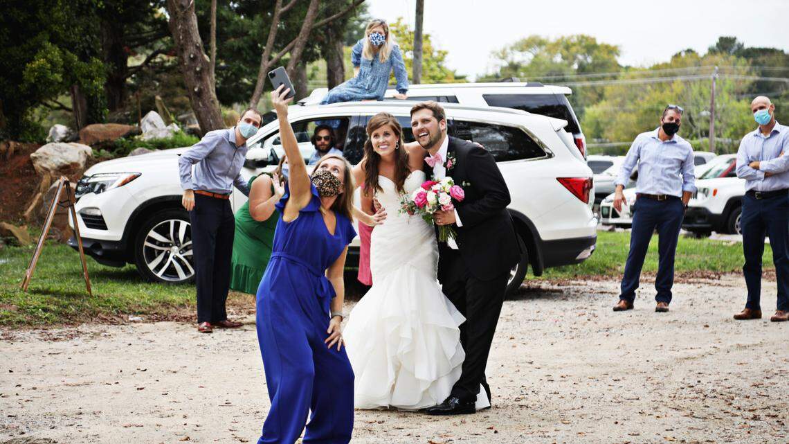 Couple’s pandemic wedding is a parking lot promise to love and cherish, no matter what