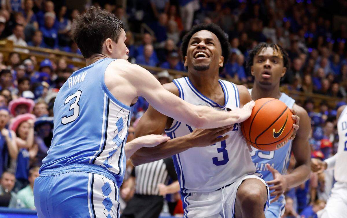 North Carolina’s Cormac Ryan (3) knocks the ball from Duke’s Jeremy Roach (3) during the second half of UNC’s 84-79 victory over Duke at Cameron Indoor Stadium in Durham, N.C., Saturday, March 9, 2024.