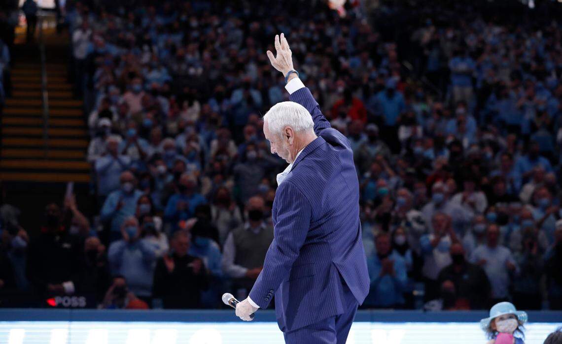 Roy Williams acknowledges the crowd after speaking during a halftime ceremony honoring him during UNC’s game against N.C. State at the Smith Center in Chapel Hill, N.C., Saturday, Jan. 29, 2022.