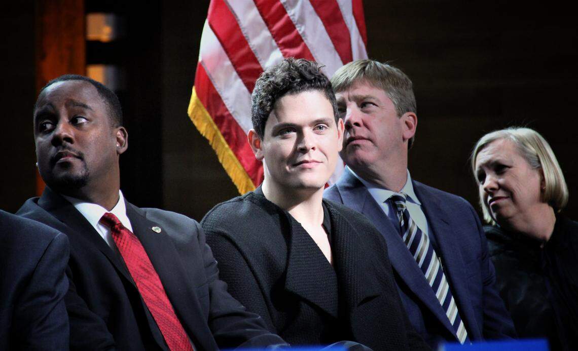 Raleigh City Council member Saige Martin, center, during his swearing-in ceremony to the Raleigh City Council at Raleigh Union Station on Dec. 2, 2019.