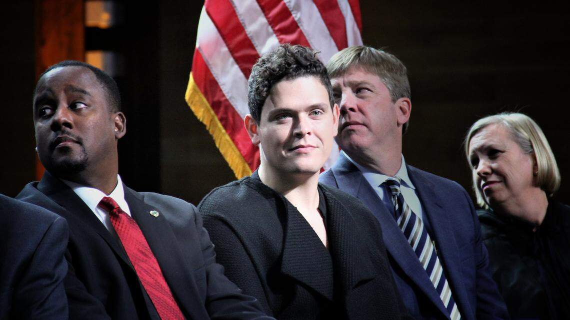 Raleigh City Council member Saige Martin, center, during his swearing-in ceremony to the Raleigh City Council at Raleigh Union Station on Dec. 2, 2019.