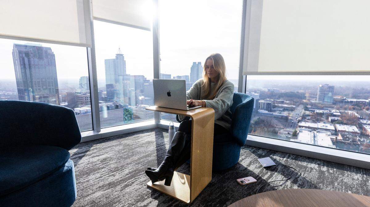 Emma Kauffman, a Pendo account executive, works in a common office space inside the Pendo building in downtown Raleigh.
