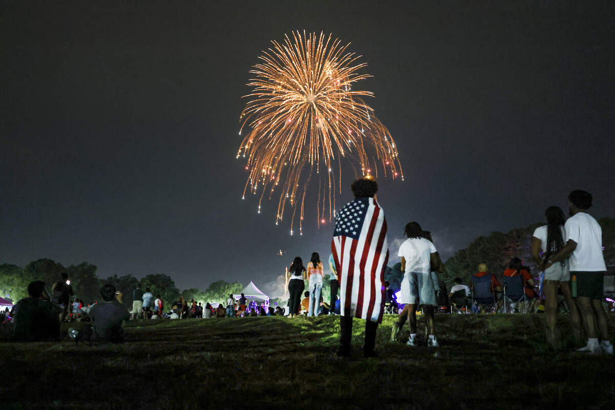 Spectators watch the Fourth of July fireworks at Dix Park in Raleigh, N.C., Saturday, July 4, 2026.