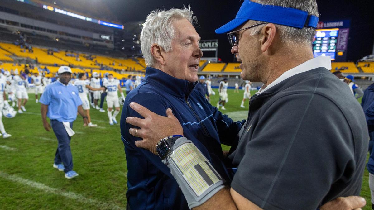 North Carolina coach Mack Brown embraces Pitt coach Pat Narduzzi following the Tar Heels’ 41-24 victory on Saturday, September 23, 2023 at Acrisure Stadium in Pittsburgh, Pa.