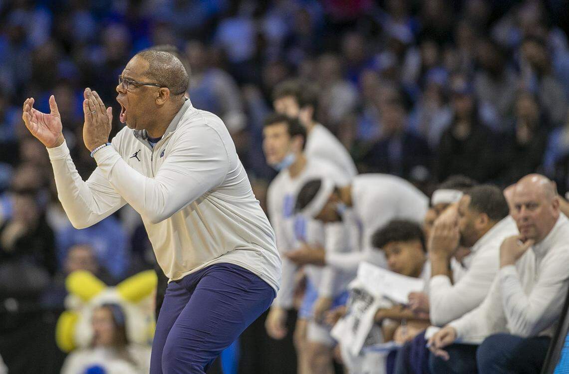 North Carolina coach Hubert Davis applauds his players on defense in the first half against UCLA on Friday, March 25, 2022 during the NCAA East Regional semi-final at Wells Fargo Center in Philadelphia, Pa.